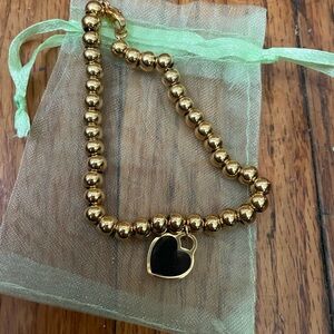 Arbonne black heart bracelet
